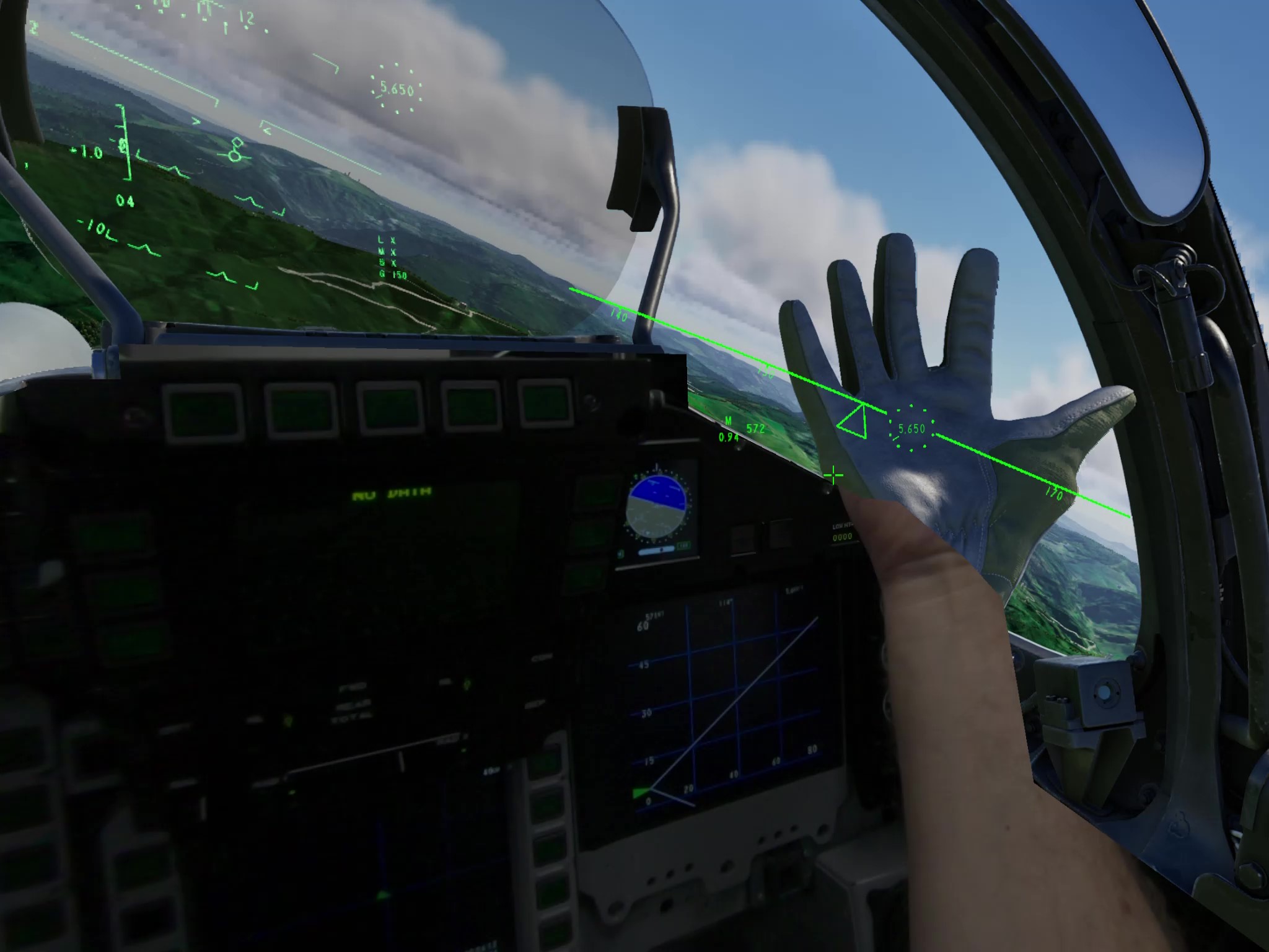 In this image, you can see the virtual view of the jet cockpit, with the jet pilot looking down at his real hand